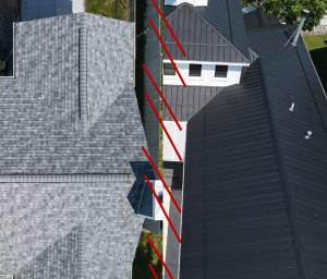 shingle versus metal roofing image from drone picture